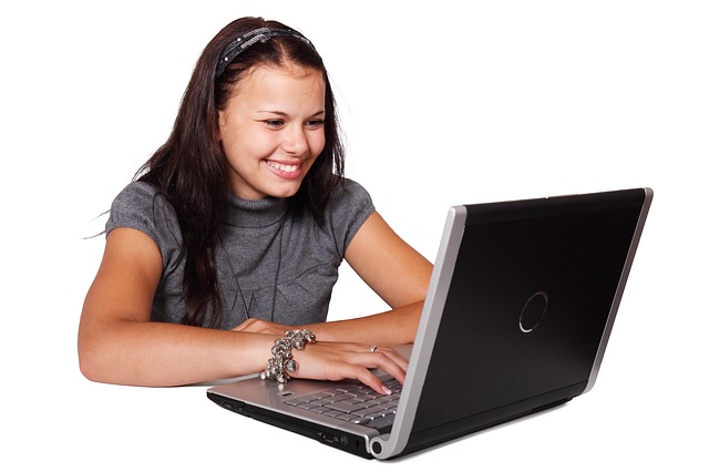 smiling girl with laptop